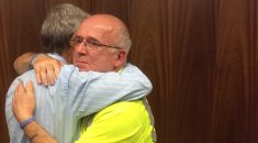 Dave Prentis hugs a member at the Redditch Time to Talk session