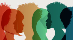 Silhouettes of heads, in translucent colours, in red, orange, yellow, blue green, blue, illustrating diversity