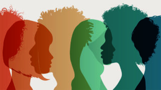Silhouettes of heads, in translucent colours, in red, orange, yellow, blue green, blue, illustrating diversity