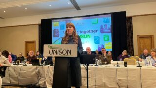 Angela Rayner speaks from the podium at UNISON national community conference 2024