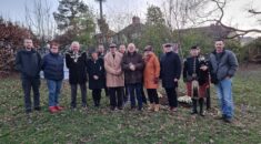 A group picture of UNISON members involved in the planting of commemorative trees at Chorley