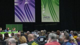 Picture of delegates and top table banners at UNISON health conference 2025