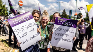 Three women holding UNISON placards that say 'Stop Subcos - Keep the NHS public'