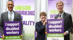 Clive Lewis MP and Sir Stephen Timms holding 'I support disabled workers' at UNISON event