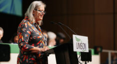 Tanya Pretswell speaking at podium