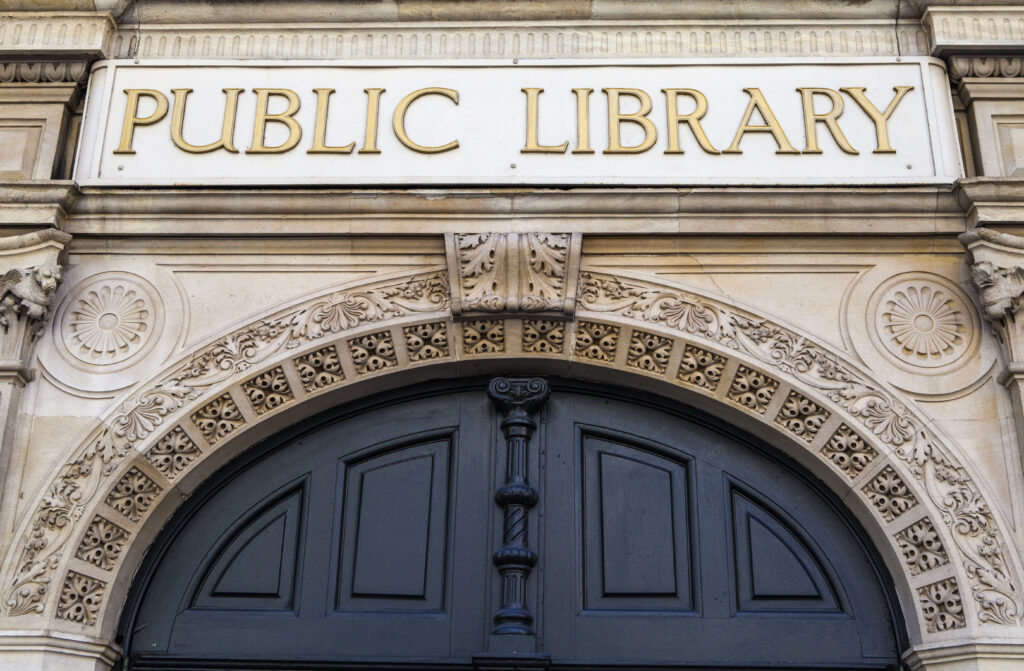 LONDON, UK - JUNE 30TH 2015: Public Library sign on the former Holborn Public Library in London, on 30th June 2015.