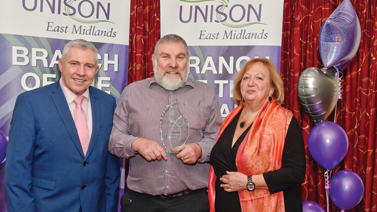 Chris Tansley (centre) receiving an award from Christina McAnea and East Midlands regional secretary Chris Jenkinson