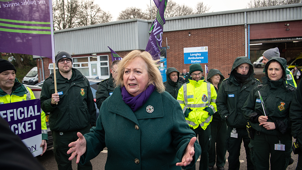 Christina McAnea on a picket line, surrounded by members